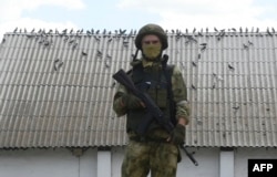 Російський солдат у Мелітополі, липень 2022 року