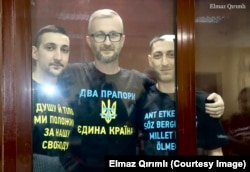 Кримськотатарські активісти Наріман Джелял, Асан та Азіз Ахтемови на засіданні в російському суді в Сімферополі, 21 вересня 2022 року