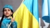 UKRAINE – A girl in a national Crimean Tatar costume during a rally on the Day of Remembrance of the victims of the genocide of the Crimean Tatar people. Kyiv, May 18, 2019
